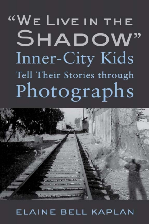 Cover image for book "We Live in the Shadow"